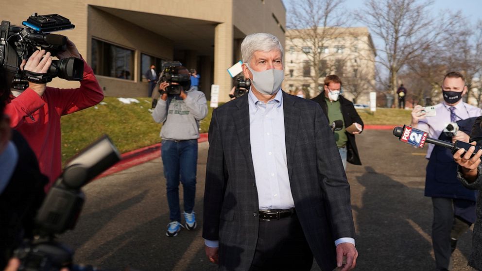 PHOTO: Former Michigan Governor Rick Snyder exits after video arraignment on two counts of willful neglect of duty over the lead-poisoning of drinking water in Flint, at the Genesee County Jail in Flint, Mich., Jan. 14, 2021.