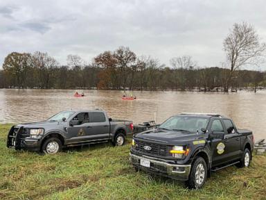 2 poll workers die after vehicle swept off highway in floodwaters: Officials