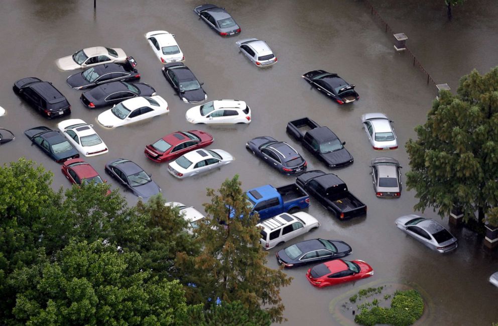 Flooded sit cars near the Addicks Reservoir as floodwaters from Hurricane Harvey in Houston, Aug. 29, 2017.