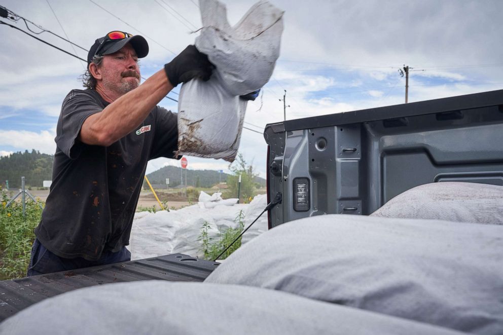 PHOTO: Danny Cobb loads sandbags into his truck at the sandbag site off of Highway 89 and Campbell Avenue in Flagstaff, Ariz., Aug. 19, 2022.


News Flagstaff Flooding