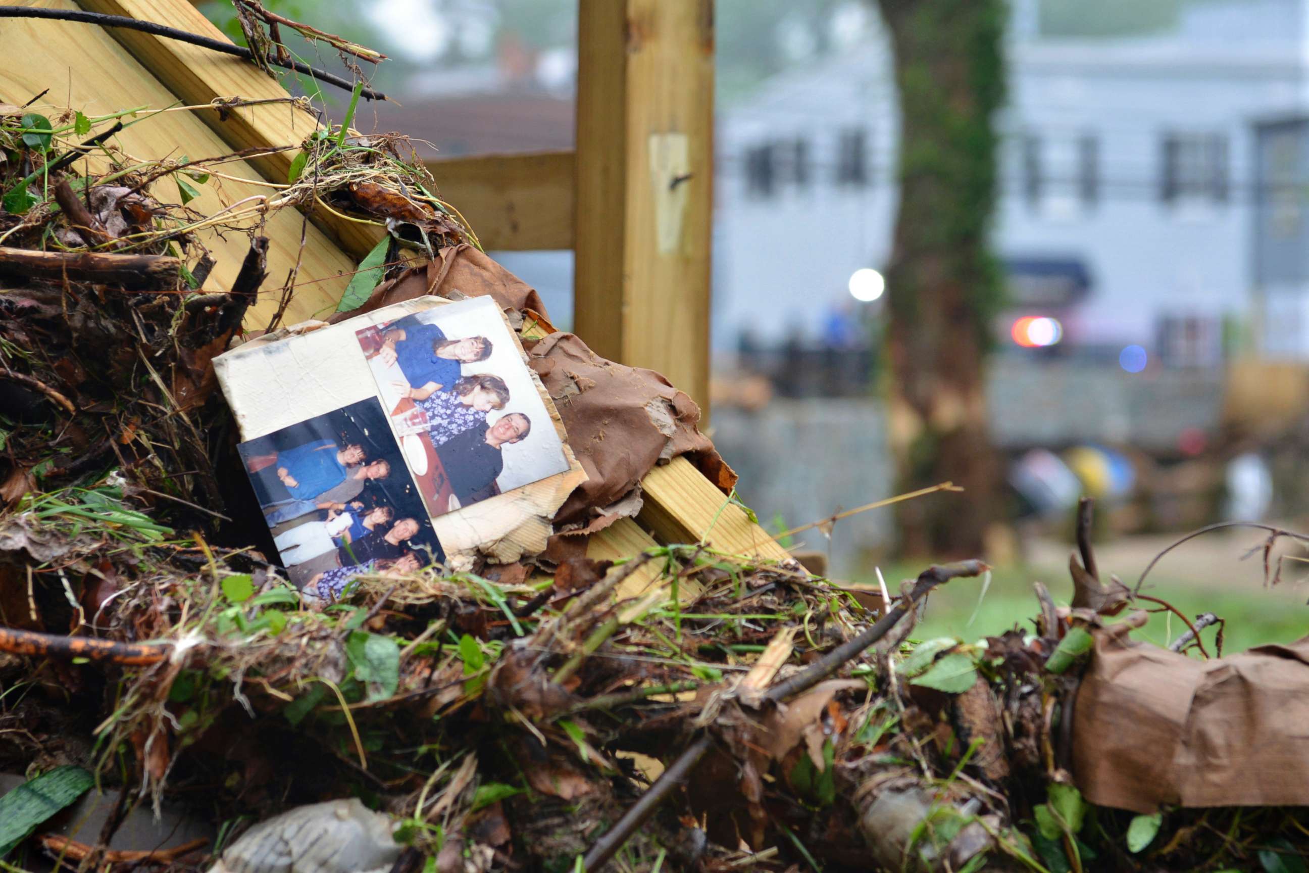 PHOTO: Family photos rest among debris after flash flooding in Ellicott City, Md., May 28, 2018. 