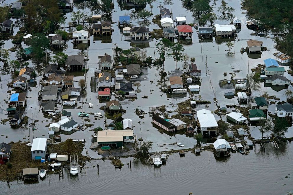 PHOTO: In this Sept. 1, 2021, file photo, floodwaters slowly recede in the aftermath of Hurricane Ida in Lafitte, La., about 25 miles south of New Orleans.