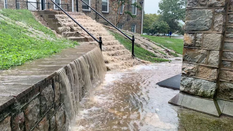 PHOTO: Floodwater gushes down steps during flash floods in Emmitsburg, Md., Sept. 1, 2021.