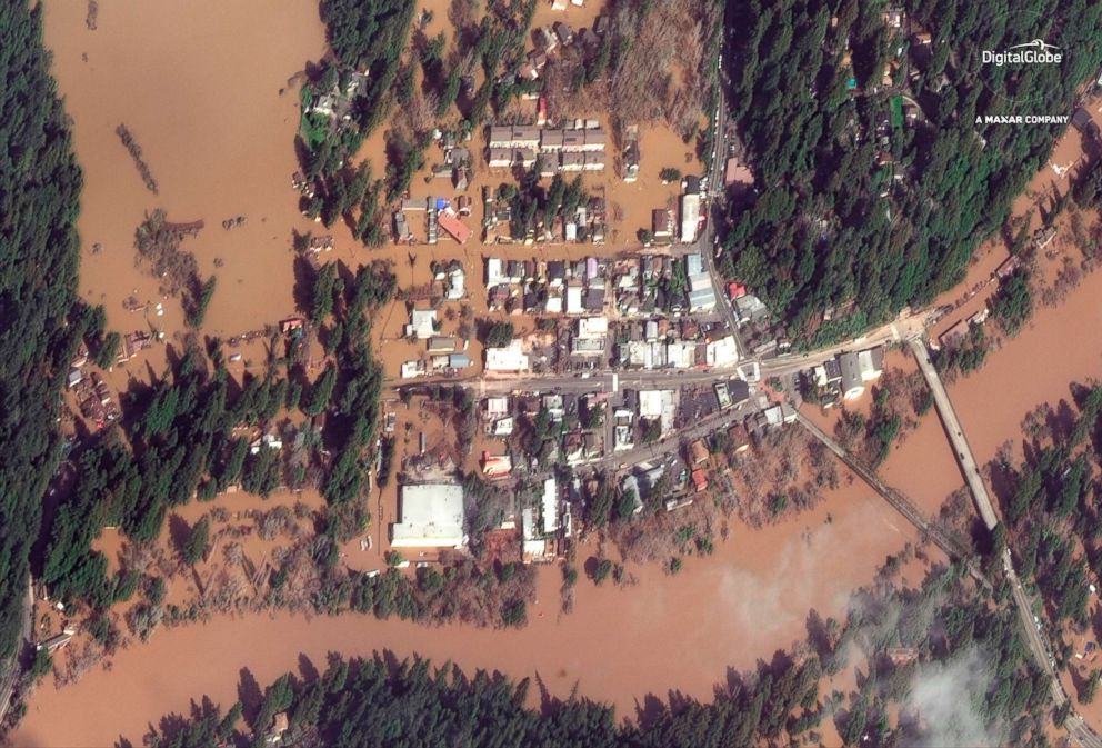 PHOTO: This Feb. 28, 2019, satellite image provided by DigitalGlobe shows The Russian River flooding Guerneville, Calif.