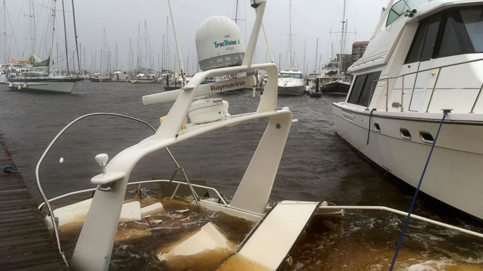PHOTO: The mast of a sunken boat sits at a dock at the Grand View Marina in New Bern, N.C., on Friday, Sept. 14, 2018. Winds and rains from Hurricane Florence caused the Neuse River to swell, swamping the coastal city.