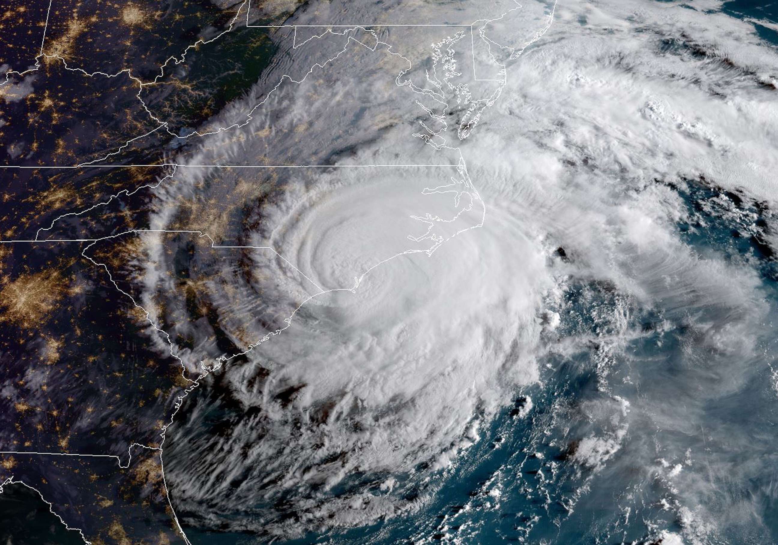 PHOTO: This NOAA/RAMMB satellite image taken Sept. 14, 2018 at 8:00 am EST shows Hurricane Florence making landfall on US east coast.