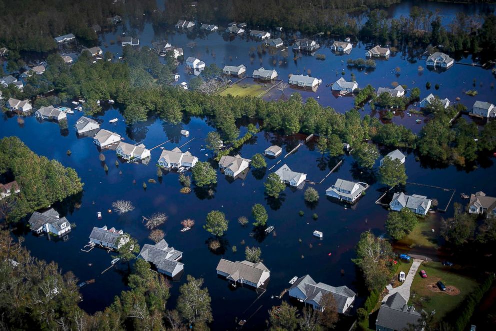 PHOTO: Dozens of homes are surrounded by floodwaters brought to the area by Hurricane Florence in Pender County, N.C., Sept. 22, 2018. The floodwaters have swallowed an estimated 25 percent of Pender county.