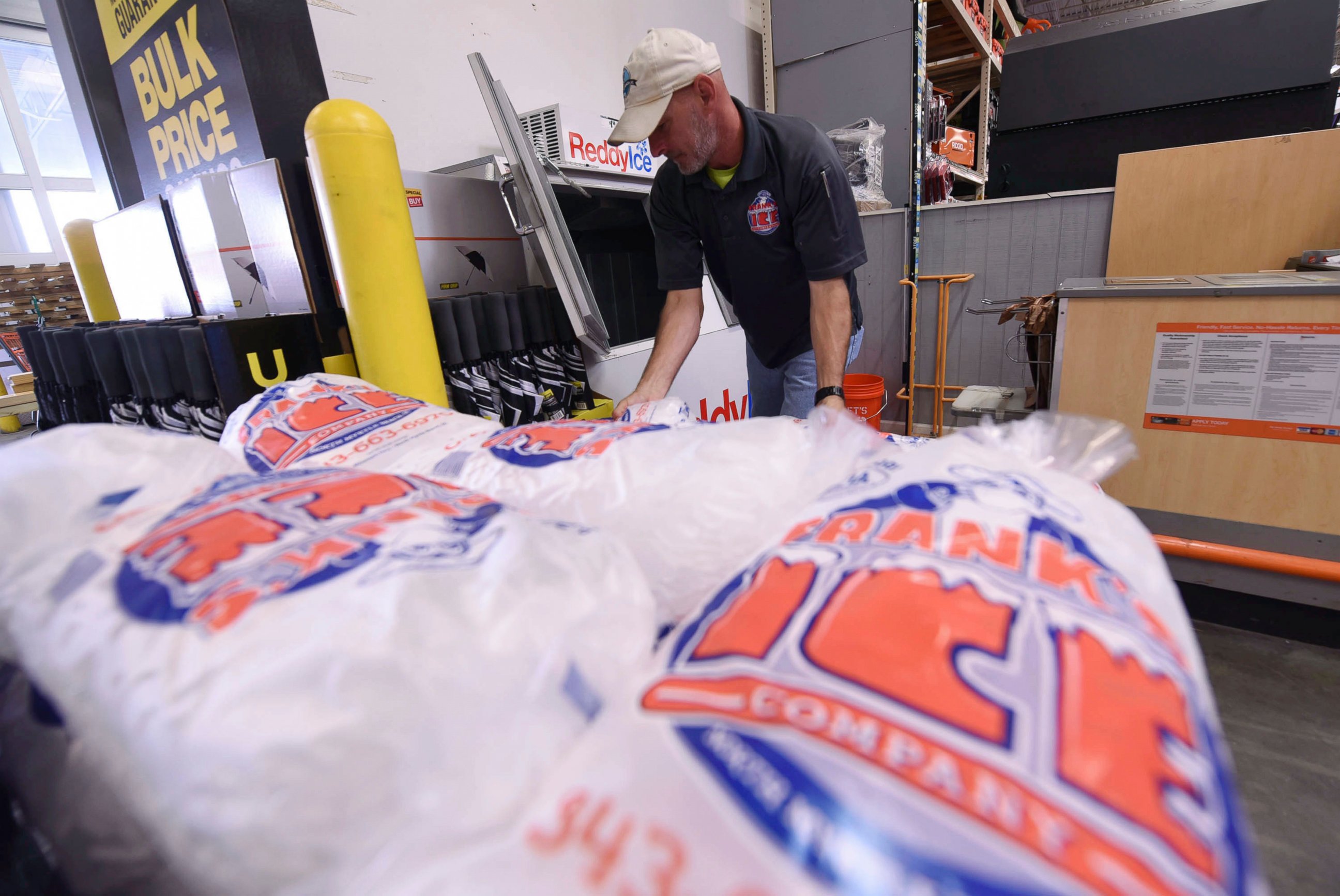 PHOTO: Mike Herring with Frank's Ice Company unloads another pallet of ice as people buy supplies at The Home Depot on Monday, Sept. 10, 2018, in Wilmington, N.C.