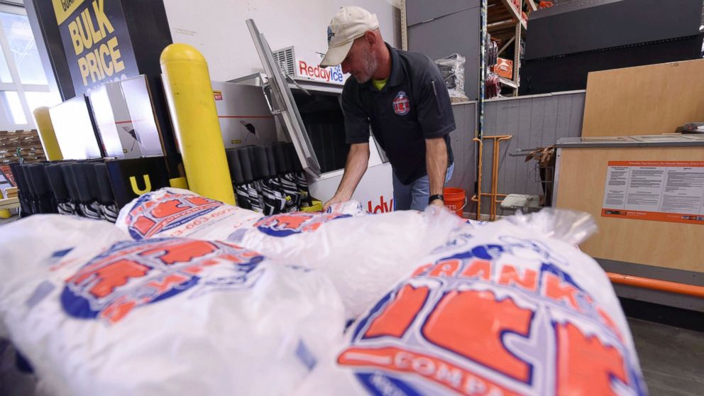 PHOTO: Mike Herring with Frank's Ice Company unloads another pallet of ice as people buy supplies at The Home Depot on Monday, Sept. 10, 2018, in Wilmington, N.C.