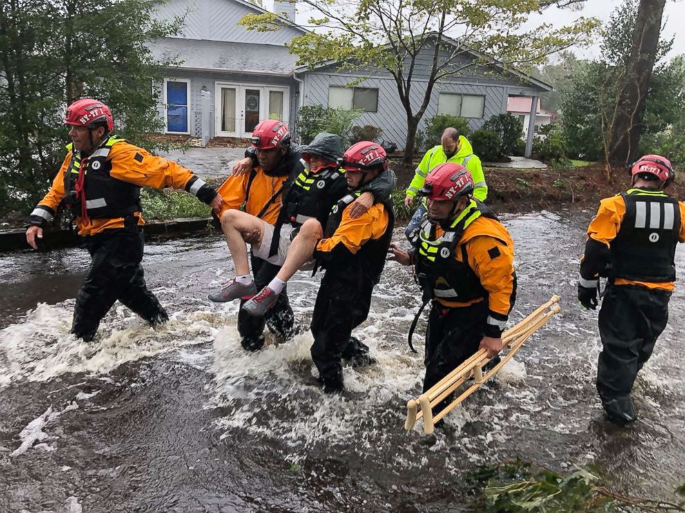 PHOTO: New York search and rescue workers rescue man from Hurricane Florence flood in River Bend, NB on September 14, 2018.