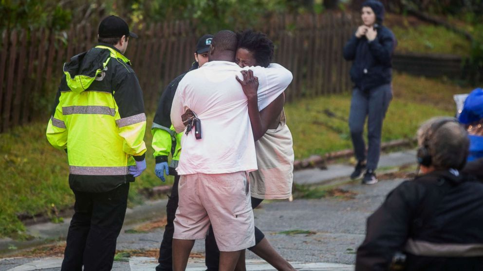 PHOTO: A woman reacts upon learning a giant tree fell on her family members' house when Hurricane Florence came ashore in Wilmington, N.C., Sept. 14, 2018.