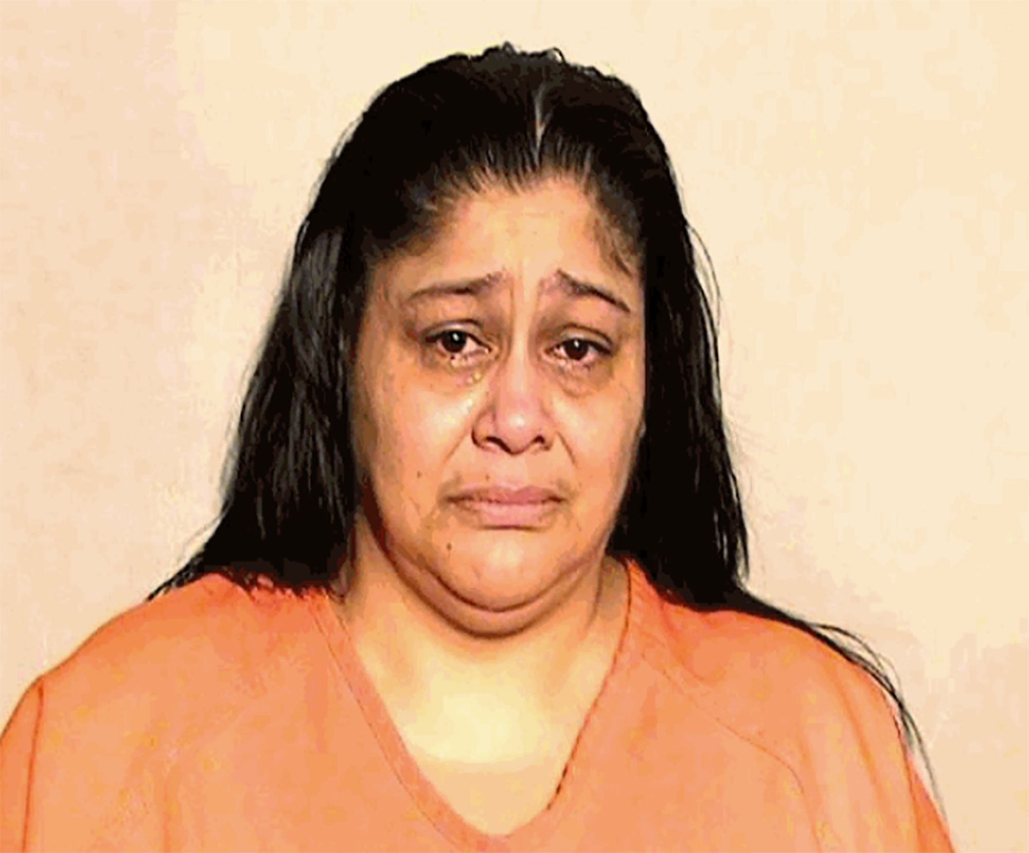 PHOTO: Yisenya Flores in a police booking photo. 