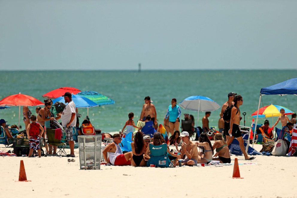 PHOTO: People visit Clearwater Beach on May 20, 2020 in Clearwater, Florida.
