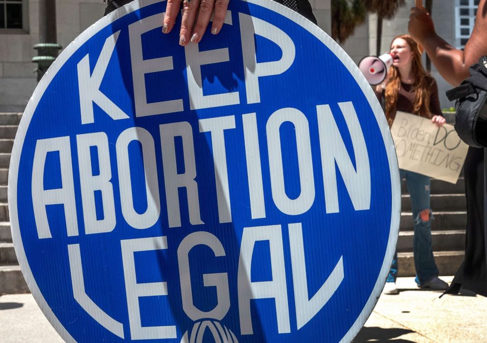 PHOTO:Abortion right activists protest in front of the Miami-Dade County Courthouse, in Miami, July 1, 2022. 