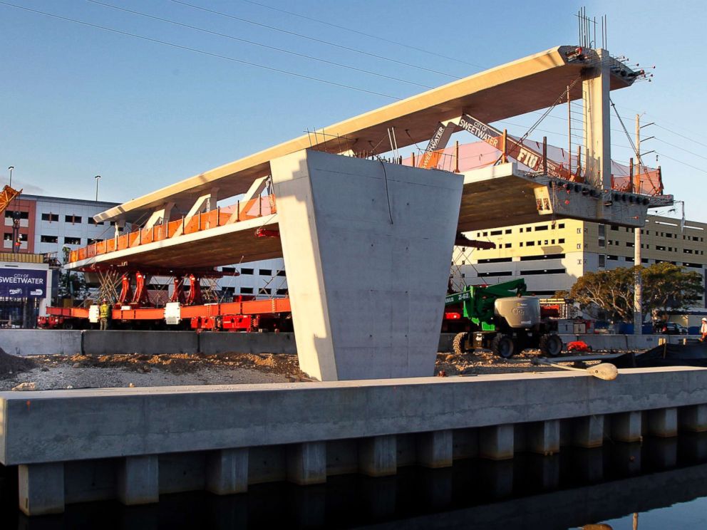 PHOTO: This March 10, 2018 image shows an early morning view of the main span of the a pedestrian bridge as it was being positioned to connect the City of Sweetwater, Fla., to Florida International University near Miami.