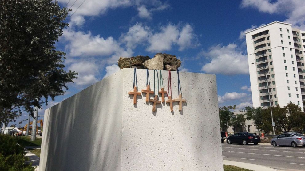 PHOTO: Six crosses are placed at a makeshift memorial on the Florida International University campus in Miami, March 17, 2018, near the scene of a pedestrian bridge collapse on March 15.
