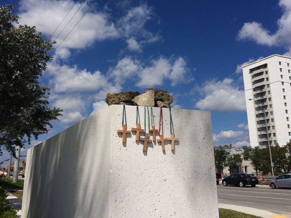 PHOTO: Six crosses are placed at a makeshift memorial on the Florida International University campus in Miami, March 17, 2018, near the scene of a pedestrian bridge collapse on March 15.
