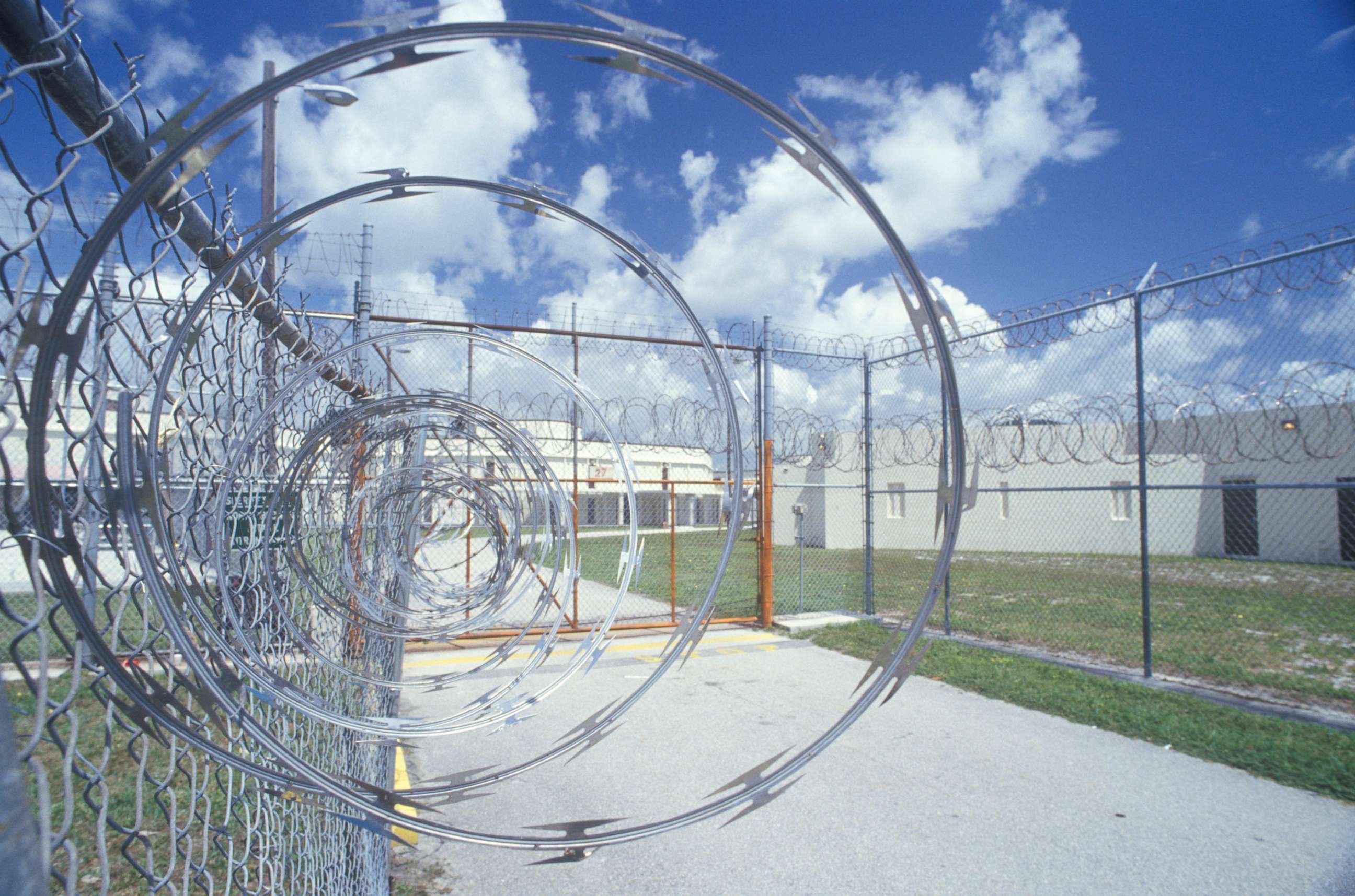 PHOTO: Barbed wire tops the fence at Dade County Men's Correctional Facility, Fla., Jan. 1, 2002.