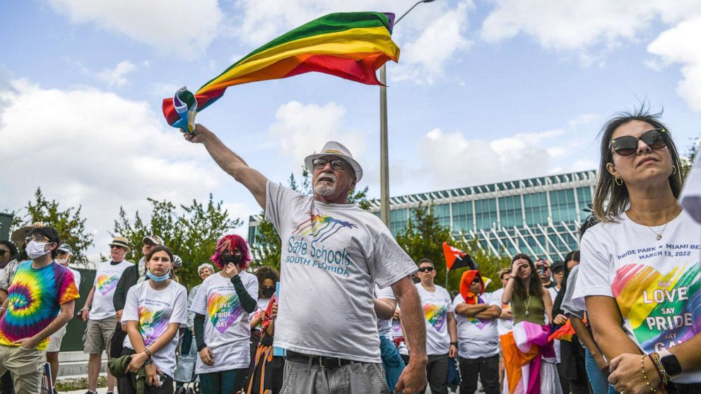 PHOTO: Members and supporters of the LGBTQ community attend the "Say Gay Anyway" rally in Miami, March 13, 2022. Florida's state senate passed a controversial bill on March 8 banning lessons on sexual orientation and gender identity in elementary schools.
