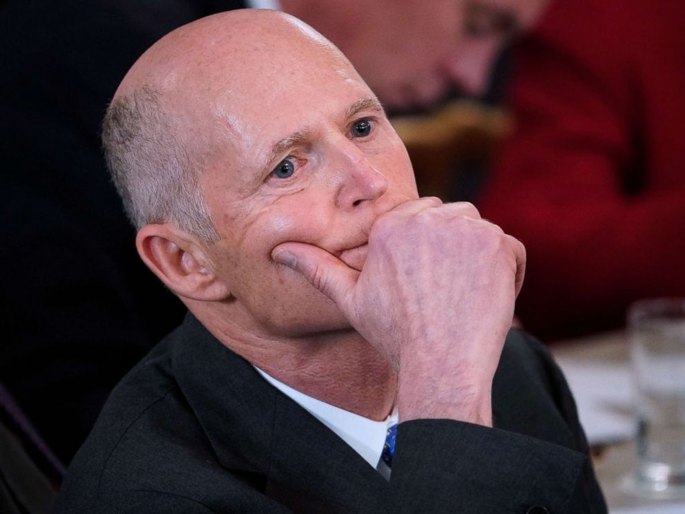 PHOTO: Florida Governor Rick Scott listens to a speaker at the White House on Feb. 26, 2018 in Washington.