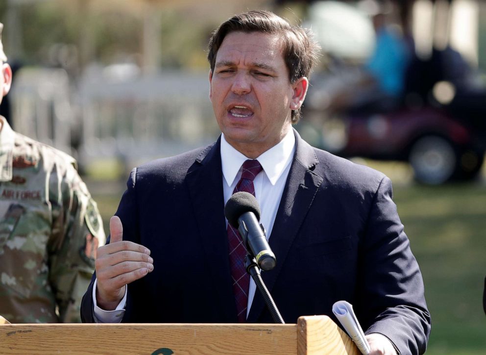 PHOTO: Florida Gov. Ron DeSantis delivers remarks during a press conference at a coronavirus mobile testing site Monday, March 23, 2020, in The Villages, Fla.