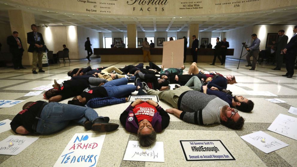 PHOTO: About 20 protesters participate in a die-In on the fourth floor rotunda of the Florida Capitol, in Tallahassee, March 6, 2018, as they continue to push for an assault weapons ban. 