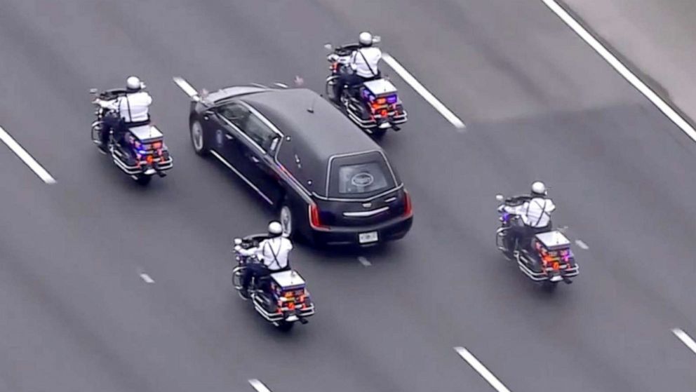PHOTO: A procession escorts the remains of FBI Agent Laura Schwartzenberger to a memorial service in Miami Garderns, Fla., Feb. 6, 2021.
