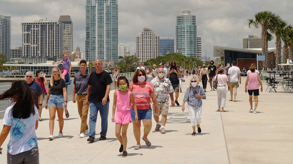 PHOTO: Crowds of people explore the newly completed St. Petersburg Pier in St. Petersburg, Fla., July 12, 2020.