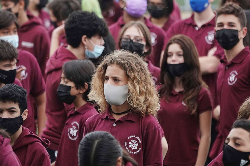 PHOTO: Students at Ruth K. Broad Bay Harbor K-8 Center in Bay Harbor Islands, Fla., wear face masks during anevent on Aug. 26, 2021.