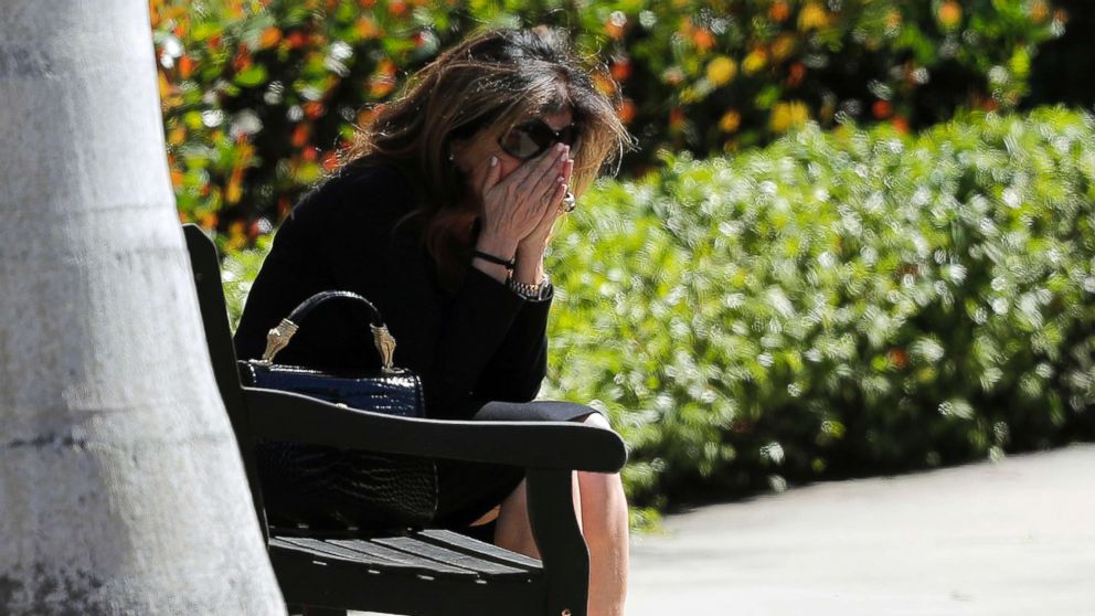 PHOTO: A woman weeps as she sits outside the Temple K'ol Tikvah before the funeral of Meadow Pollack, a victim of the Wednesday shooting at Marjory Stoneman Douglas High School, in Parkland, Fla., Feb. 16, 2018.