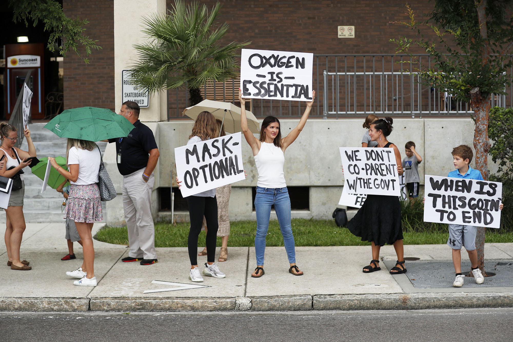 PHOTO: Families protest any potential mask mandates before the Hillsborough County Schools Board meeting held at the district office in Tampa, Fla., July 27, 2021.