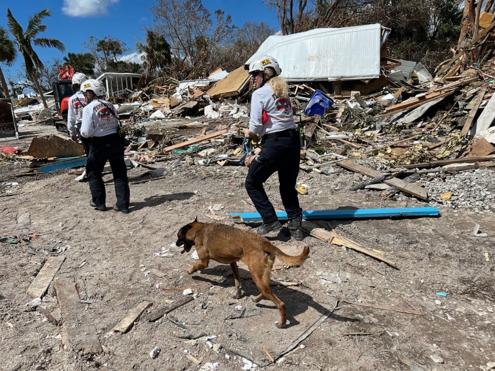 PHOTO: Members of the Virginia Task Force 2 Urban Search and Rescue team search for victims at the Red Coconut RV Park in Fort Myers, Fla. on Oct. 5, 2022.