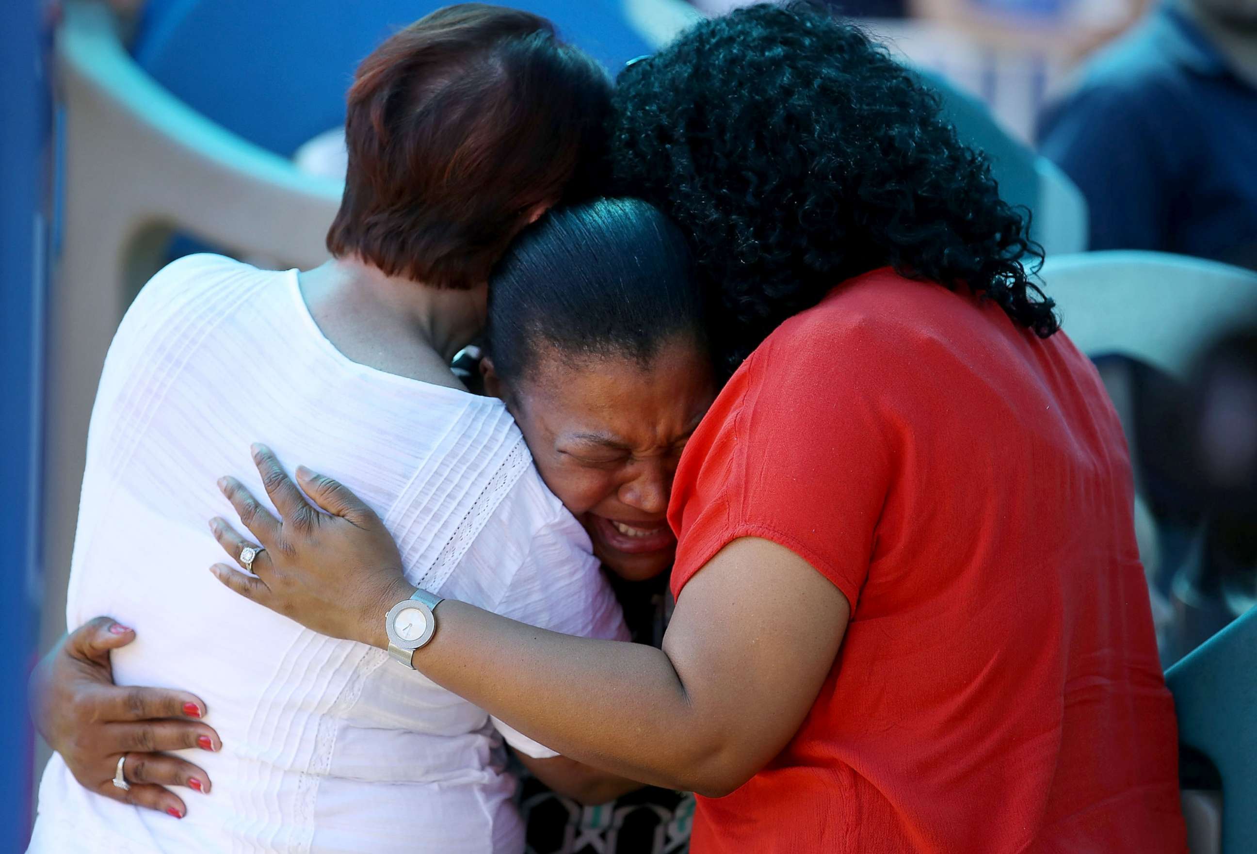 PHOTO: A women breaks down with emotion during a prayer vigil for families of Marjory Stoneman Douglas High School, where a mass shooting took place, at the Parkridge Church, Feb. 15, 2018, in Parkland, Fla. 