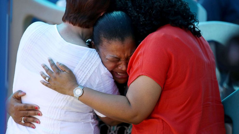 PHOTO: A women breaks down with emotion during a prayer vigil for families of Marjory Stoneman Douglas High School, where a mass shooting took place, at the Parkridge Church, Feb. 15, 2018, in Parkland, Fla. 