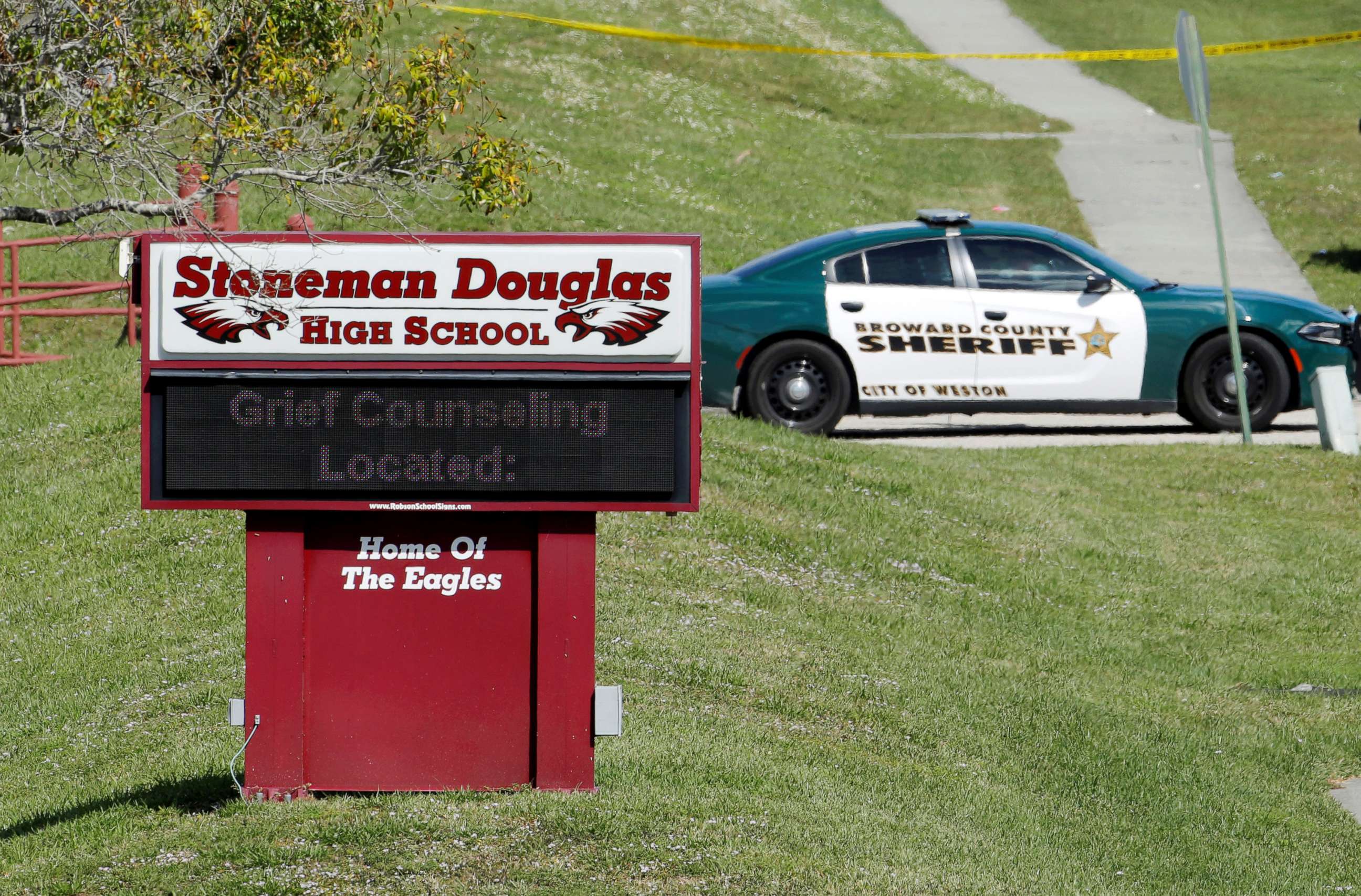 PHOTO: A message about grief counseling appears on the electronic signboard at Marjory Stoneman Douglas High School one day after a shooting at the school left 17 dead in Parkland, Fla., Feb. 15, 2018.