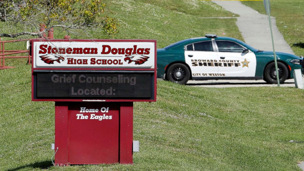 PHOTO: A message about grief counseling appears on the electronic signboard at Marjory Stoneman Douglas High School one day after a shooting at the school left 17 dead in Parkland, Fla. Feb. 15, 2018.