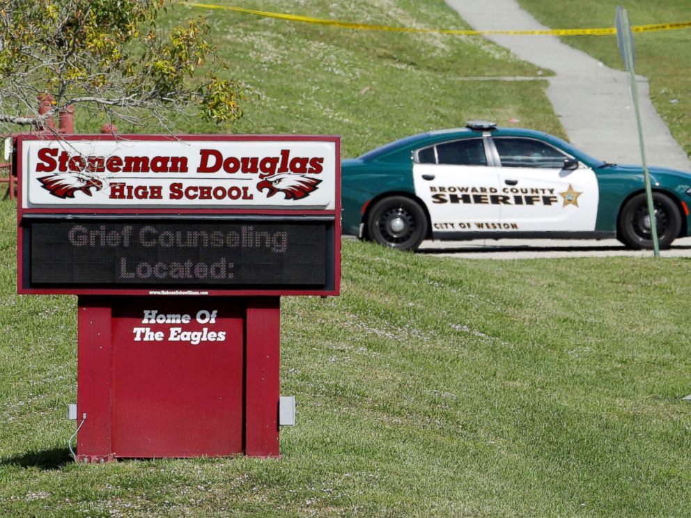 PHOTO: A message about grief counseling appears on the electronic signboard at Marjory Stoneman Douglas High School one day after a shooting at the school left 17 dead in Parkland, Fla. Feb. 15, 2018.