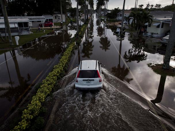 Torrential rain in Florida closes schools, knocks out power