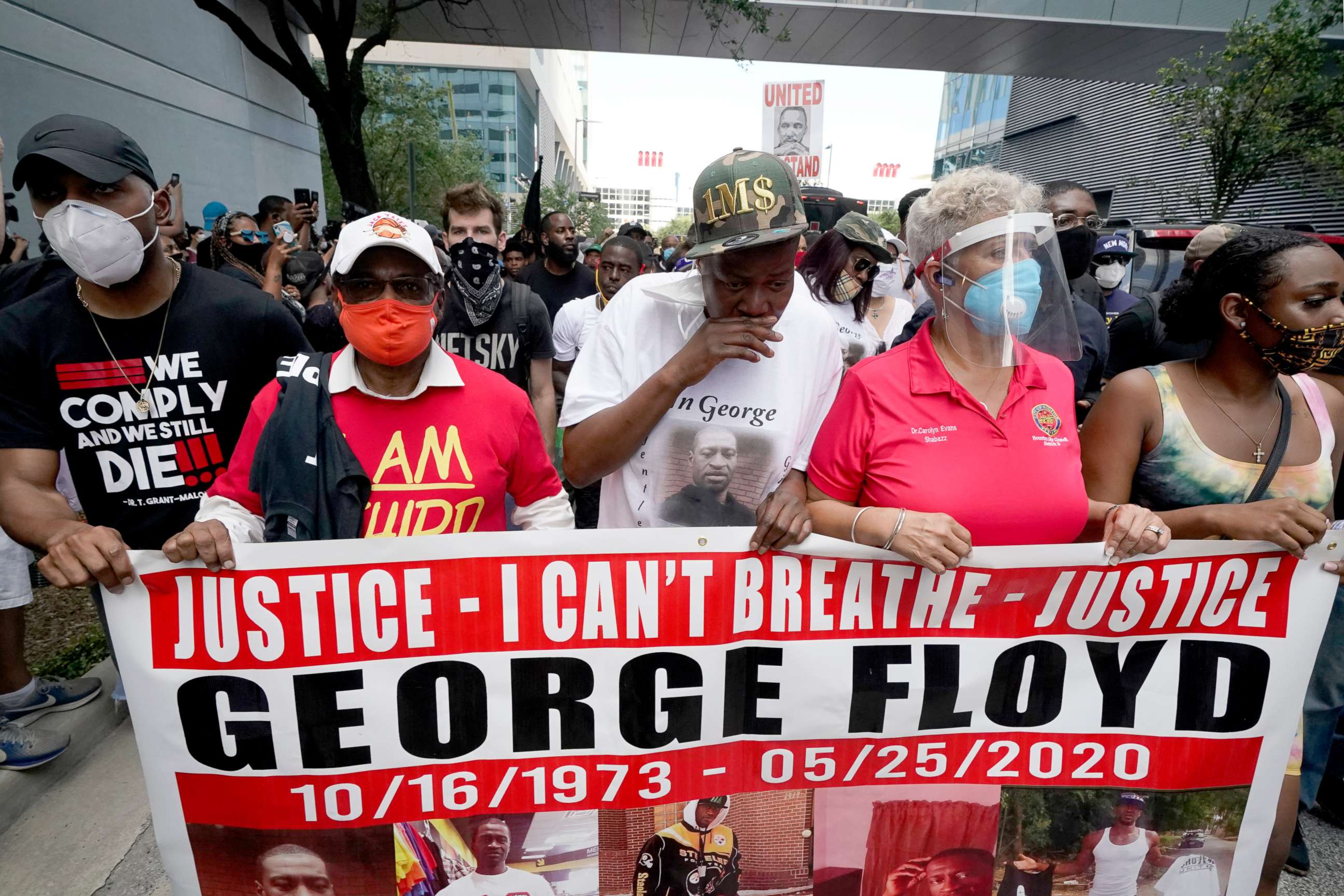 PHOTO: LaTonya Floyd, center, in hat, participates in a march to protest the death of her brother, George Floyd in Houston on Tuesday, June 2, 2020.