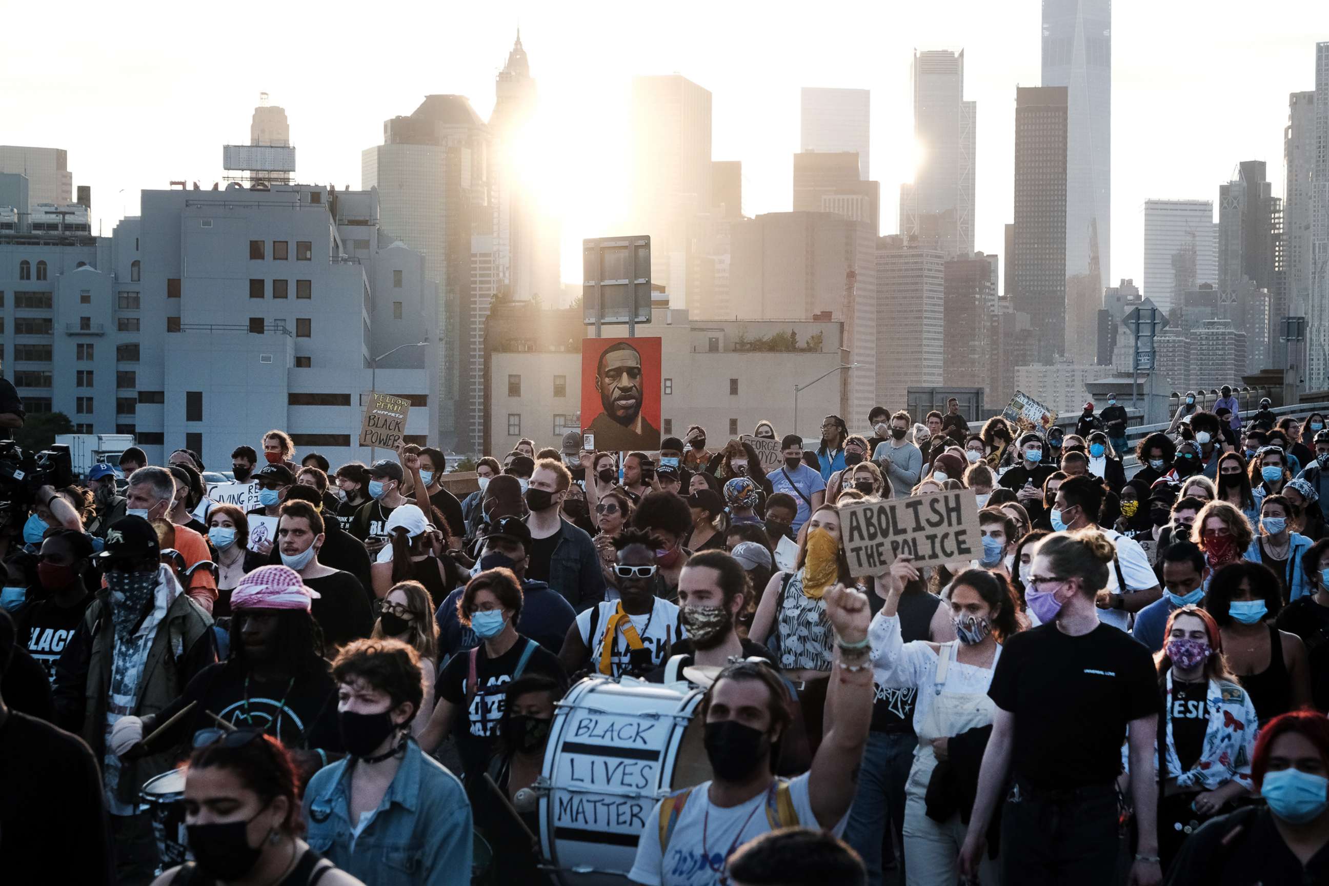 PHOTO: Demonstrators march across the Brooklyn Bridge to honor George Floyd on the one year anniversary of his death, May 25, 2021, in New York City.
