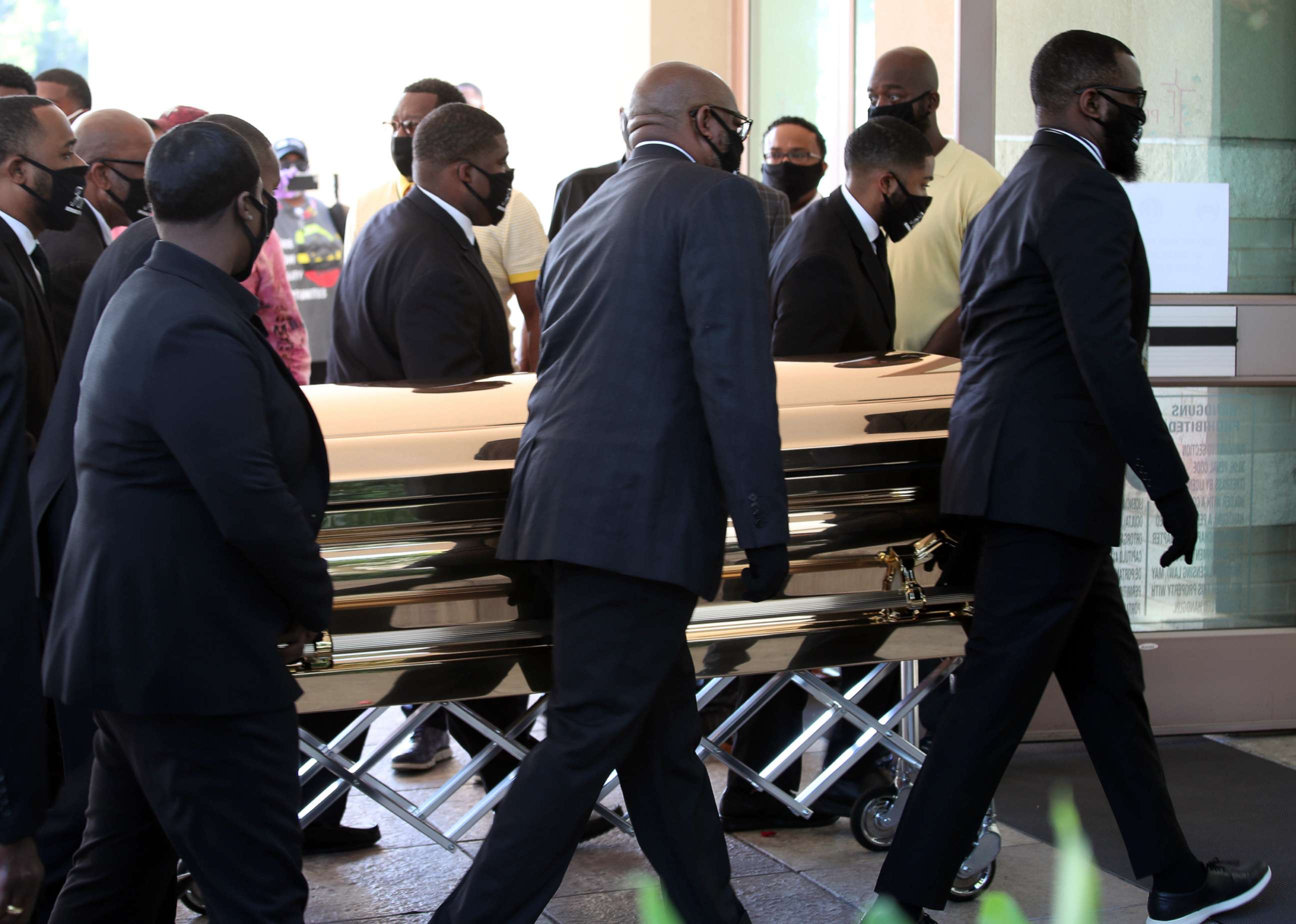 PHOTO: Men carry the coffin of George Floyd at The Fountain of Praise church in Houston, June 8, 2020.