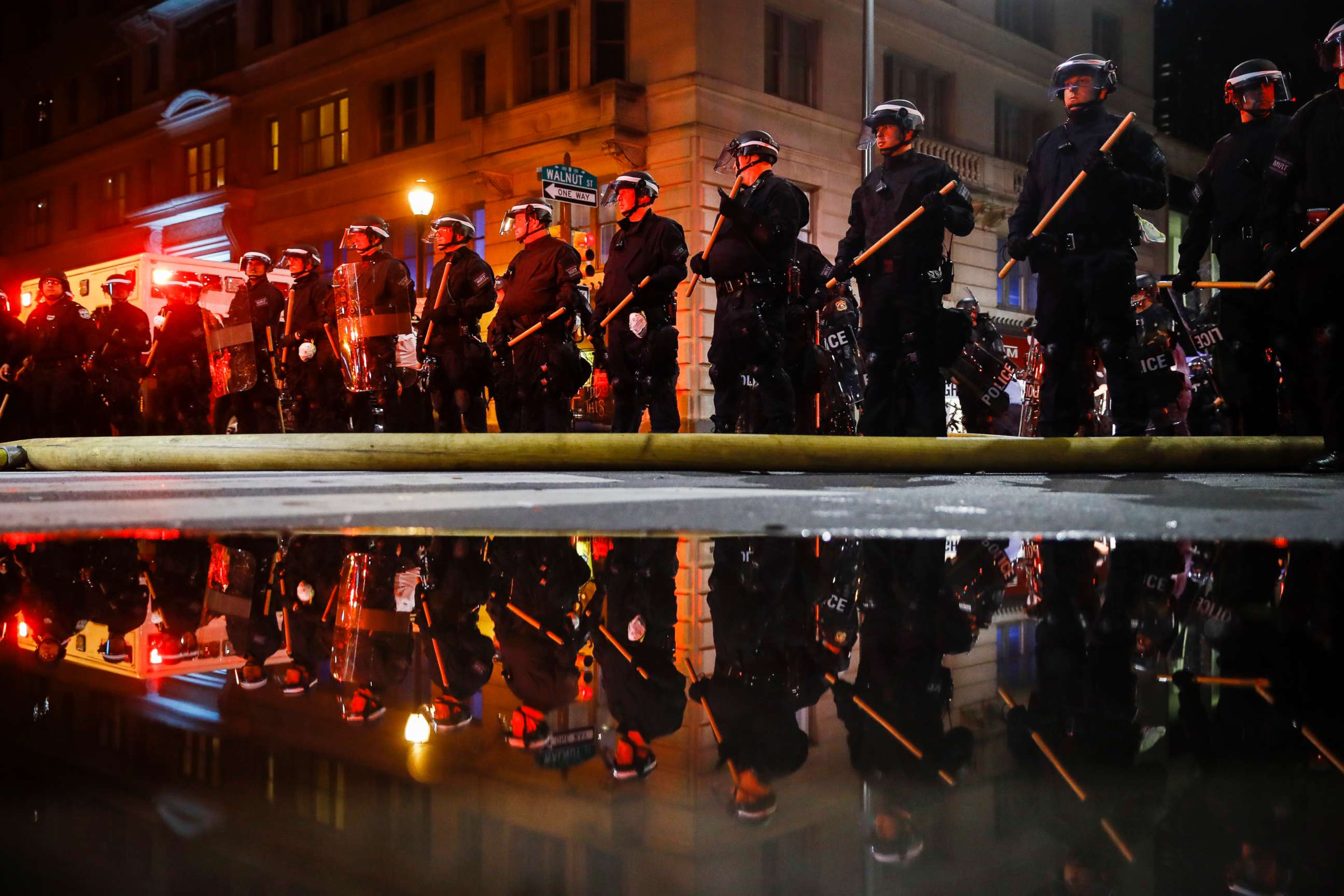PHOTO: Police are reflected as they stand guard, May 30, 2020, in Philadelphia, during a protest over the death of George Floyd.