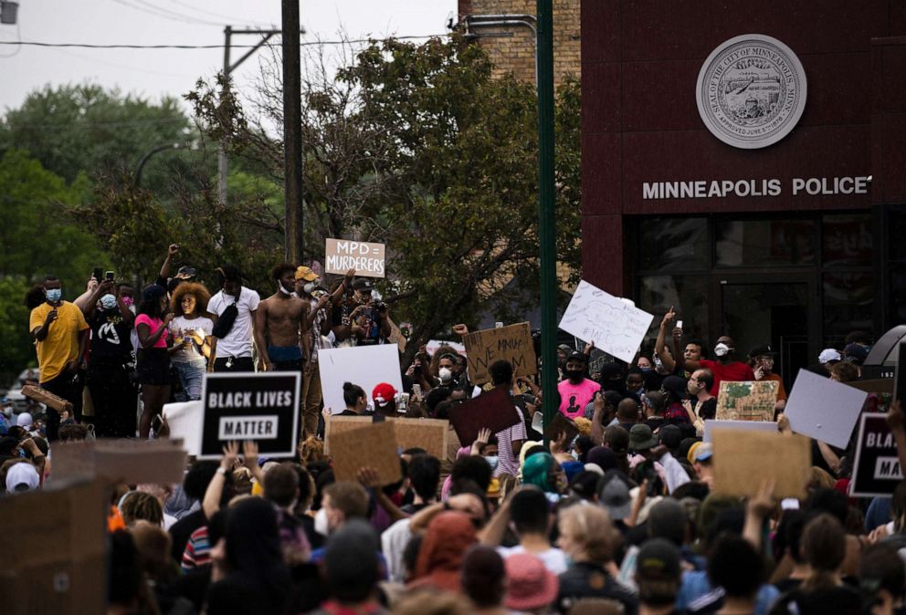 PHOTO: Protesters demonstrate against the death of George Floyd outside the 3rd Precinct Police Precinct, May 26, 2020, in Minneapolis, Minnesota.
