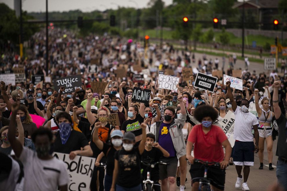 PHOTO: Protesters march on Hiawatha Avenue while decrying the killing of George Floyd, May 26, 2020, in Minneapolis, Minnesota.