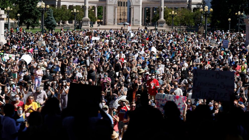 PHOTO: Demonstrators crowd into Civic Center Park during a rally calling for more oversight of the police, June 7, 2020, in Denver.