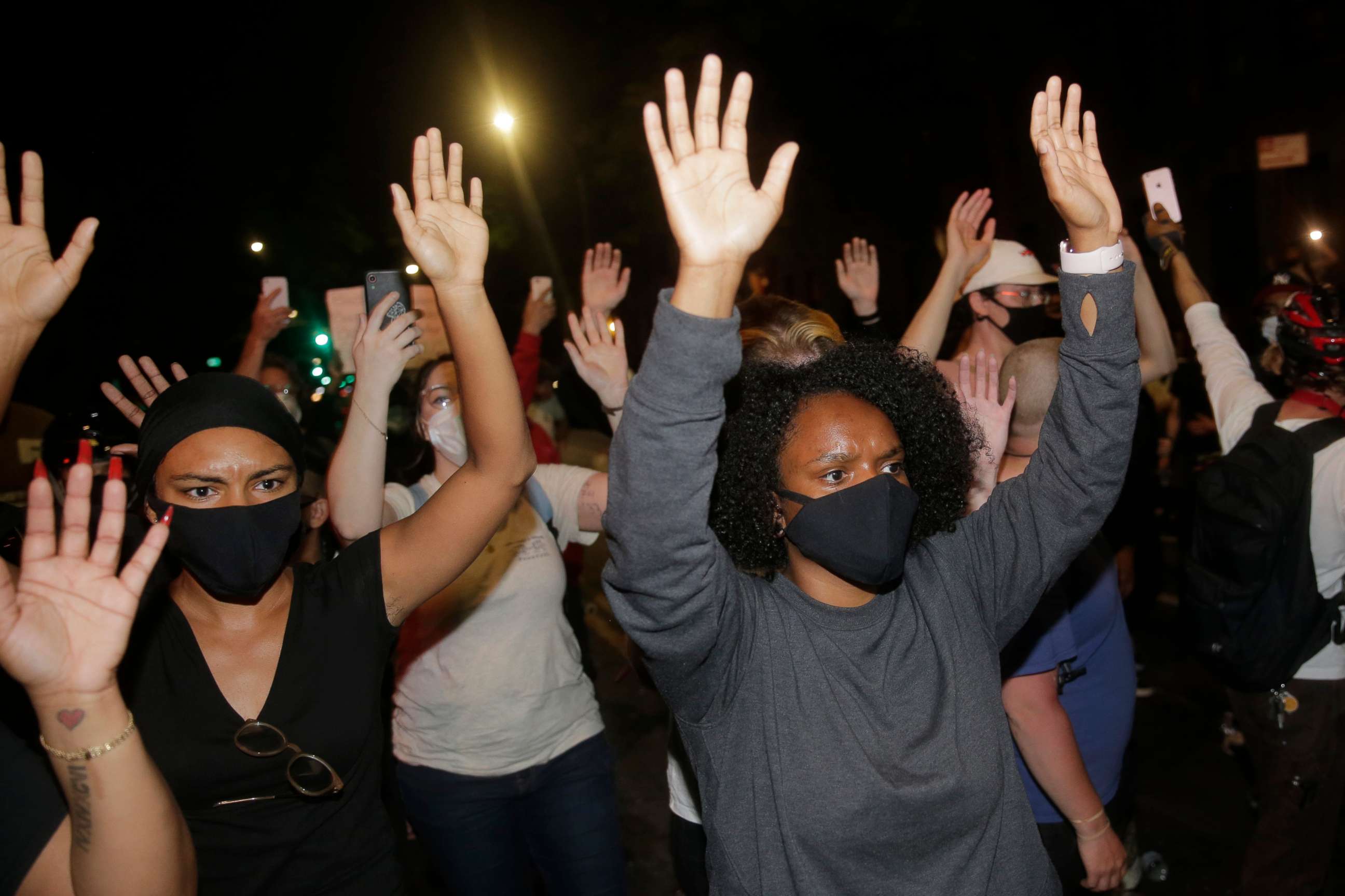 PHOTO: Protesters hold their hands in the air during a protest in response to the death of George Floyd in Minneapolis police custody, in Brooklyn New York, May 30, 2020.
