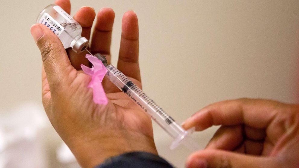 A nurse prepares a flu shot at the Salvation Army in Atlanta, Feb. 7, 2018. The U.S. government's flu report on Feb. 9, 2018 showed the flu has further tightened its grip on the U.S. This season is now as intense as the swine flu epidemic nine years ago.