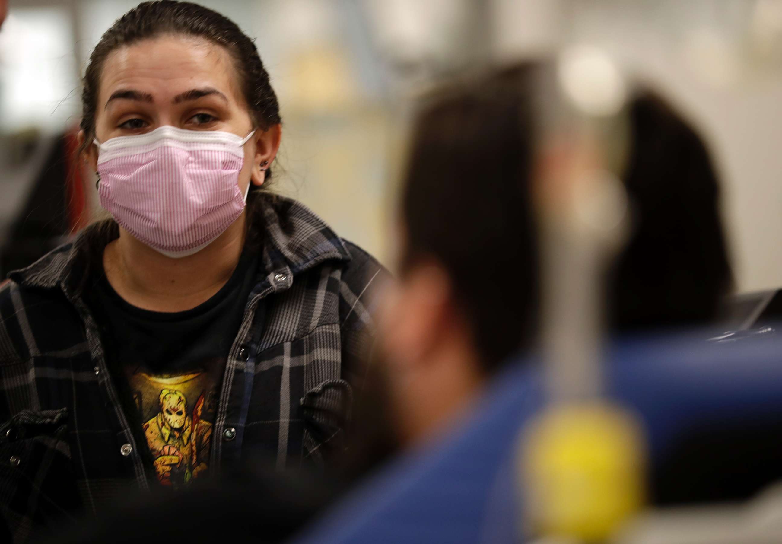 PHOTO: In this Jan. 10, 2018 photo, Torrey Jewett looks on as her roommate Donnie Cardenas recovers from the flu at the Palomar Medical Center in Escondido, Calif.