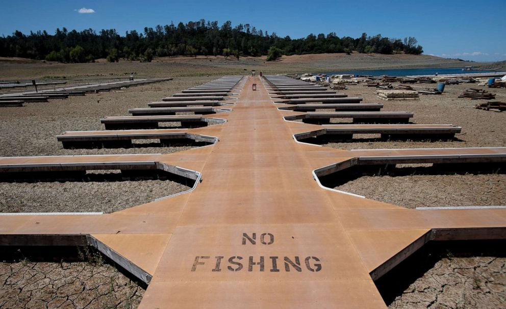 PHOTO: Empty boat docks sit on dry land at the Browns Ravine Cove area of drought-stricken Folsom Lake, currently at 37% of its normal capacity, in Folsom, Calif., May 22, 2021.