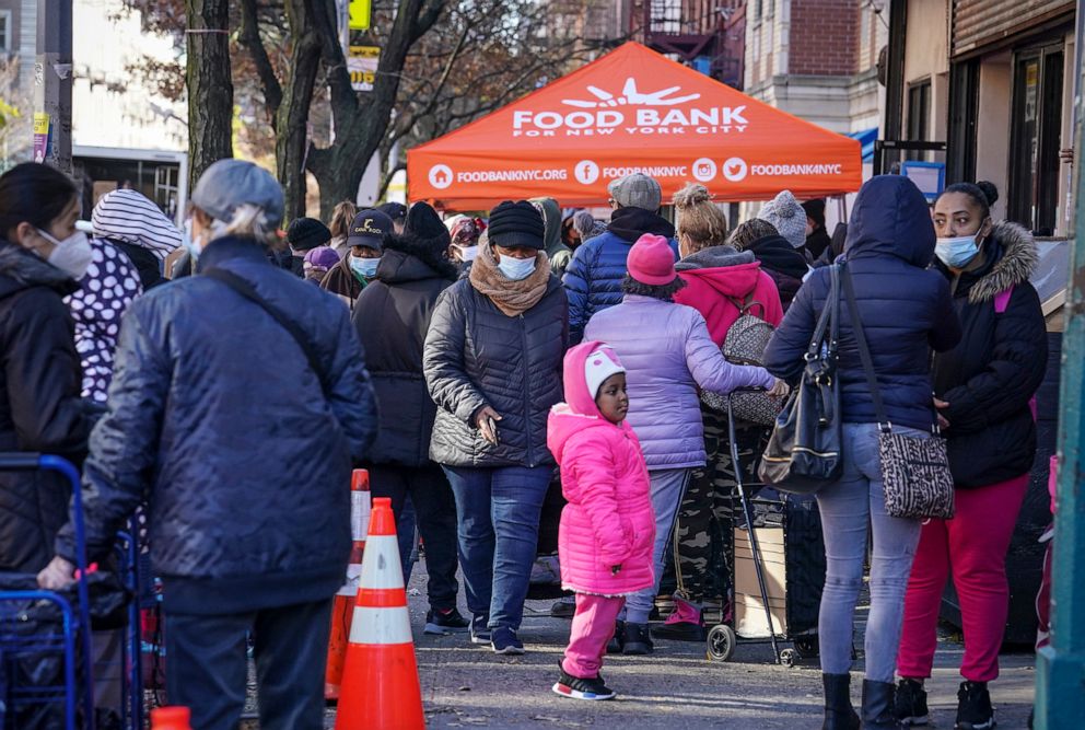 PHOTO: People gather for a food giveaway at Harlem's Food Bank For New York City, a community kitchen and food pantry, Nov. 16, 2020.